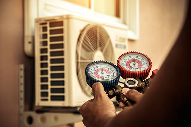 Professional Air Conditioning Service technician working in Furlong, PA